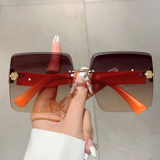 Sunset Glimmer Rimless Sunglasses